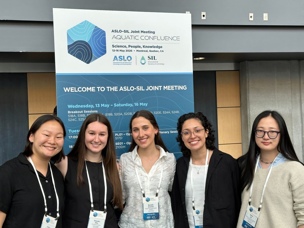 The 2024-2026 cohort of C-CoMP Bridge-to-PhD Fellows take a group picture at the ASLO-SIL Joint Meeting in May 2026. Photo credit: Victoria Centurino, WHOI.